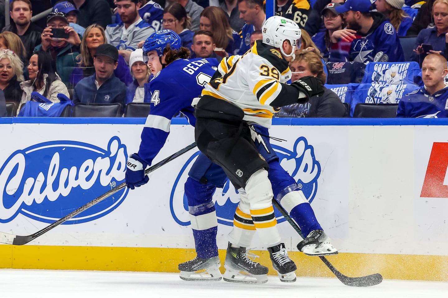 Morgan Geekie (right) caught up with his brother Conor when the Bruins visited the Lightning last January.