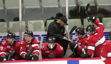 adirondack thunder players on bench during training camp workout