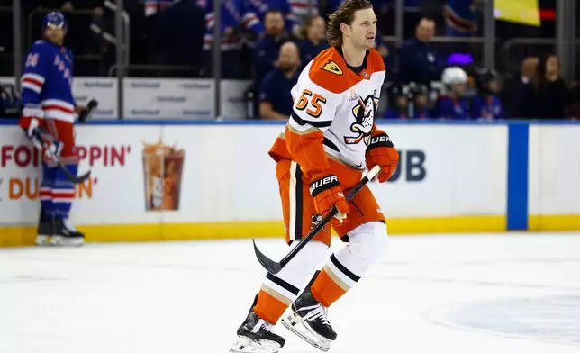 Anaheim Ducks defenseman Jacob Trouba (65) skates during warmups before an NHL hockey game against the New York Rangers, Monday, Dec 15, 2025, in New York. (AP Photo/Noah K. Murray)