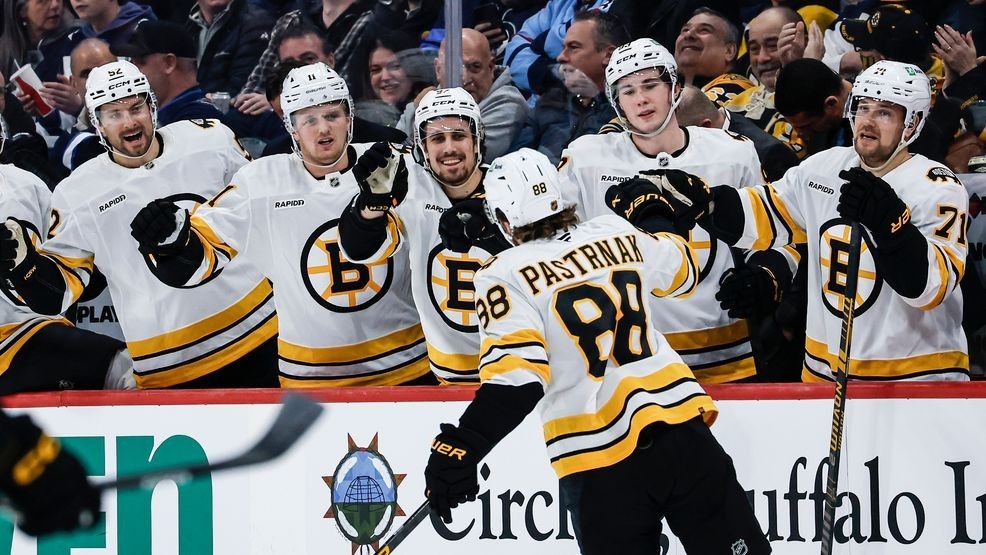 Boston Bruins' David Pastrnak (88) celebrates his goal against the Winnipeg Jets during first period NHL action in Winnipeg, Manitoba, on Thursday, Dec. 11, 2025. (John Woods/The Canadian Press via AP)