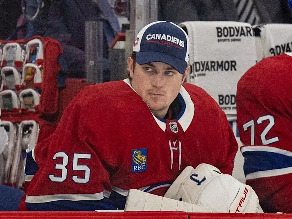 Canadiens’ Sam Montembeault watches from the bench after being pulled from the game against the Washington Capitals on Nov. 20, 2025. He could become trade bait if the team feels confident enough in Jacob Fowler and Jakub Dobes.