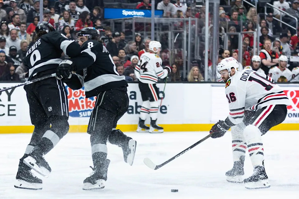 Los Angeles Kings right wing Adrian Kempe (9) and defense Drew Doughty (8) collide during an NHL game against the Chicago Blackhawks on December 6, 2025 in Los Angeles, Calif.