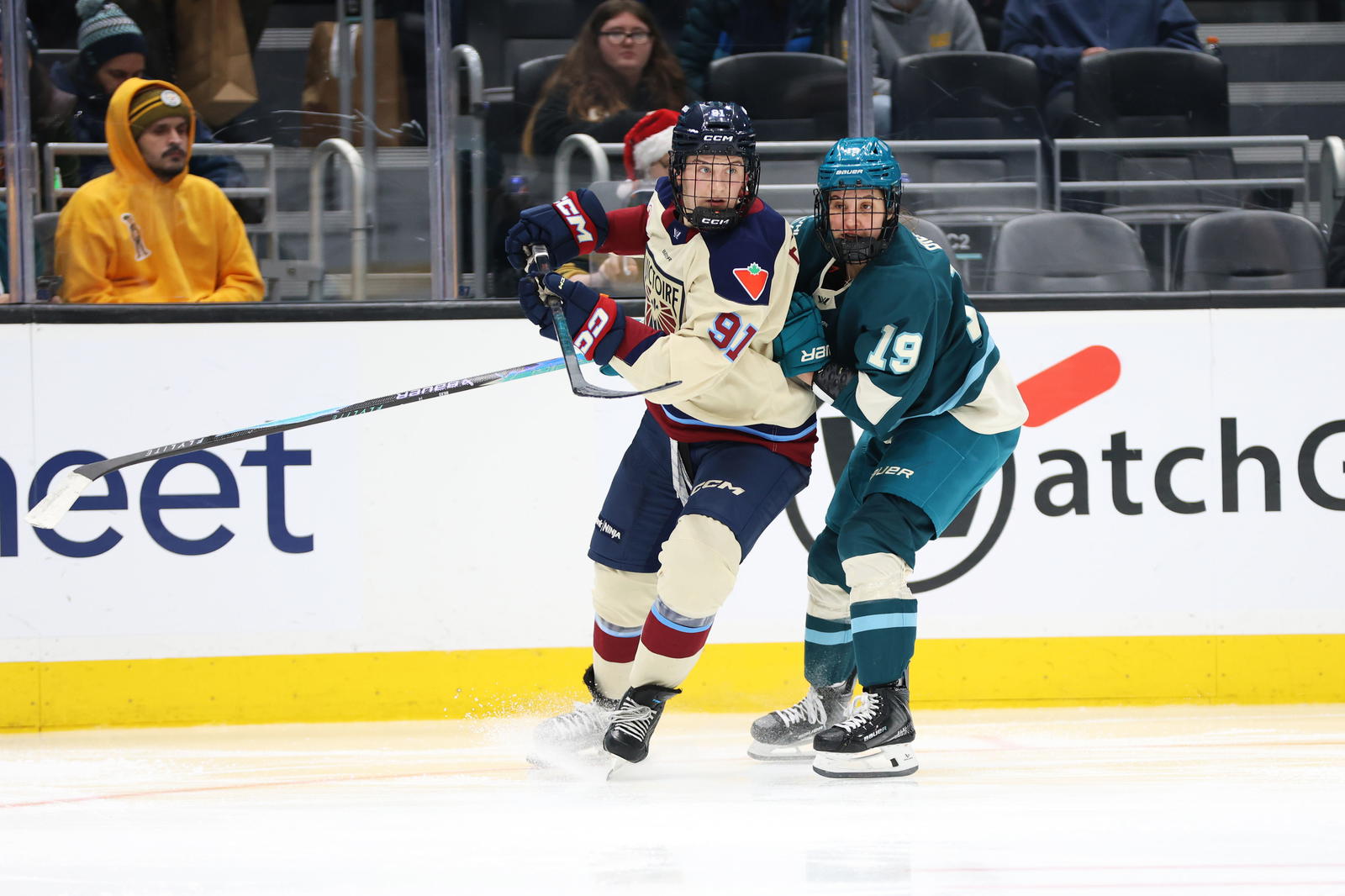 December 23, 2025: Montréal's Maggie Flaherty and Seattle's Hannah Bilka photo by Candace Kludt | The Hockey News