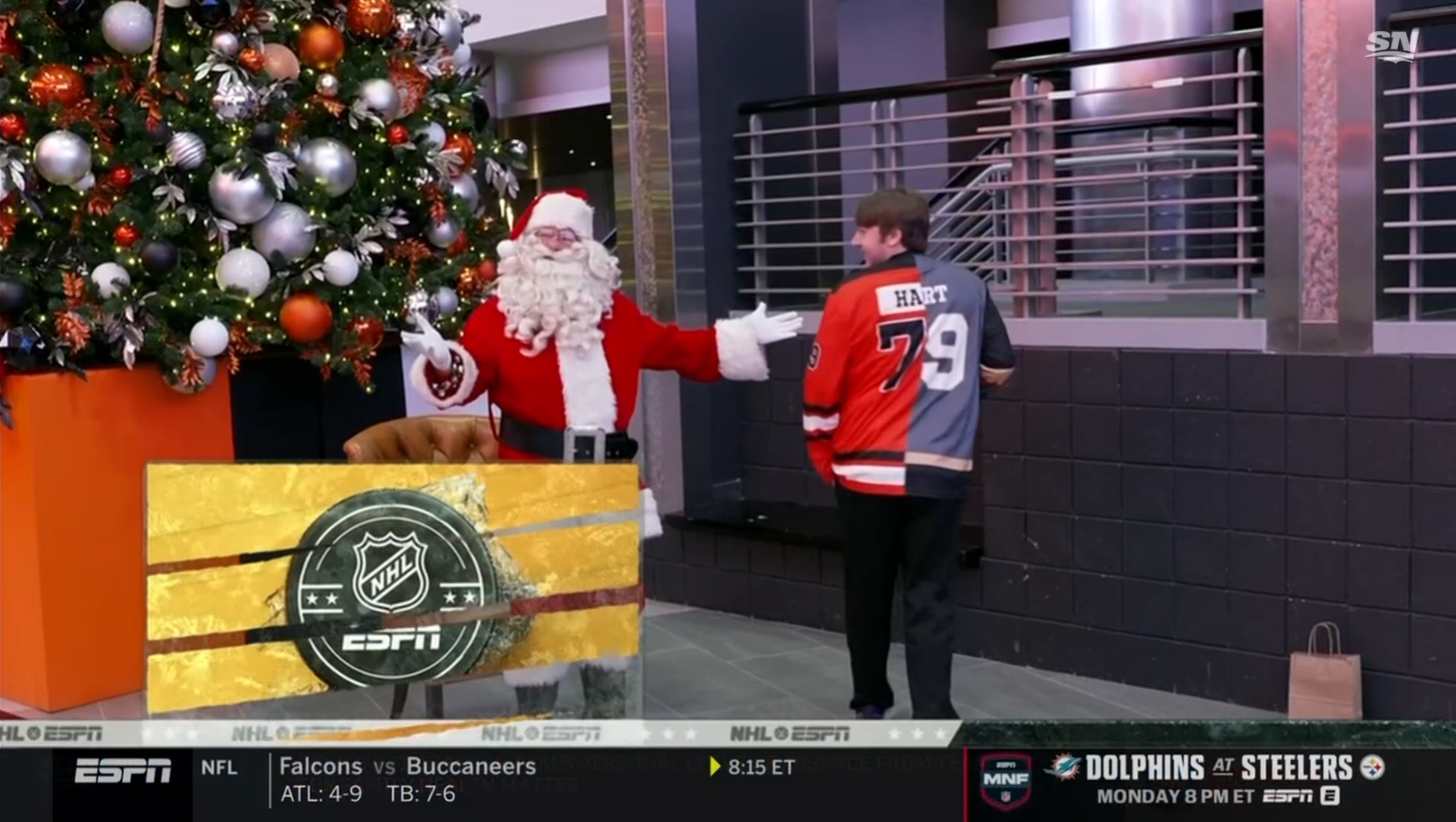 This Guy Wearing a Half-Philly, Half-Vegas Carter Hart Jersey Deserves a Santa Sack of Shit for Christmas