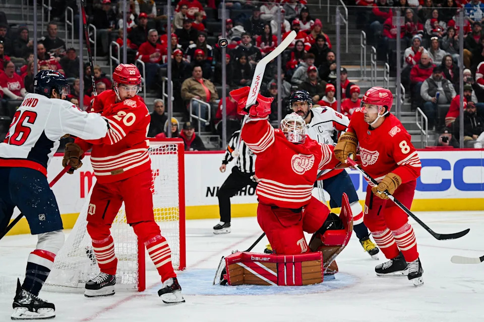 Detroit Red Wings goaltender Cam Talbot (39) makes a save during the first period against the Washington Capitals at Little Caesars Arena in Detroit on Sunday, Dec. 21, 2025.