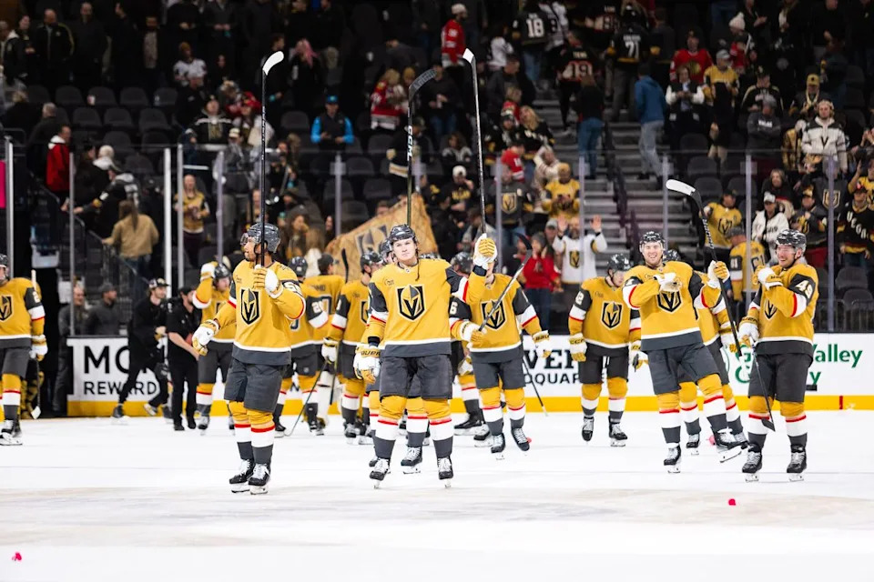 Vegas Golden Knights raise their sticks to the fans after a NHL game between the Vegas Golden Knights and the Chicago Blackhawks, Tuesday December 2, 2025 in Las Vegas, Nev.