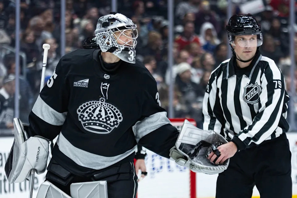 Los Angeles Kings goalie Darcy Kuemper (35) gives the puck to the referee during an NHL game against the Chicago Blackhawks on December 6, 2025 in Los Angeles, Calif.