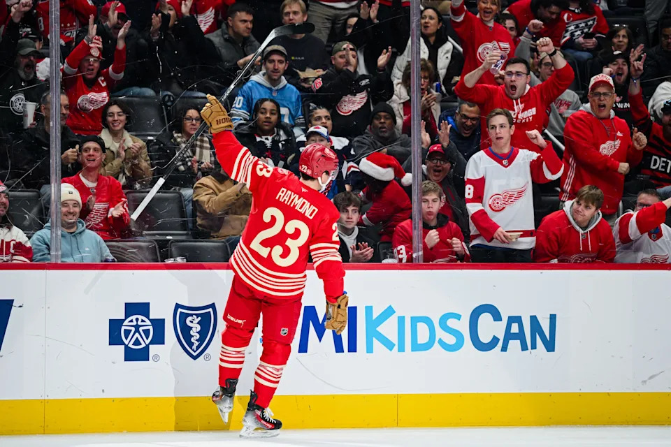 Detroit Red Wings left wing Lucas Raymond (23) celebrates his goal during the second period against the Washington Capitals at Little Caesars Arena in Detroit on Sunday, Dec. 21, 2025.