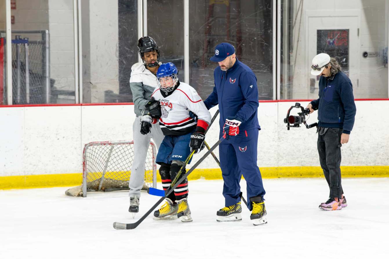 Alex Ovechkin skates with young players at the American Special Hockey Association clinic