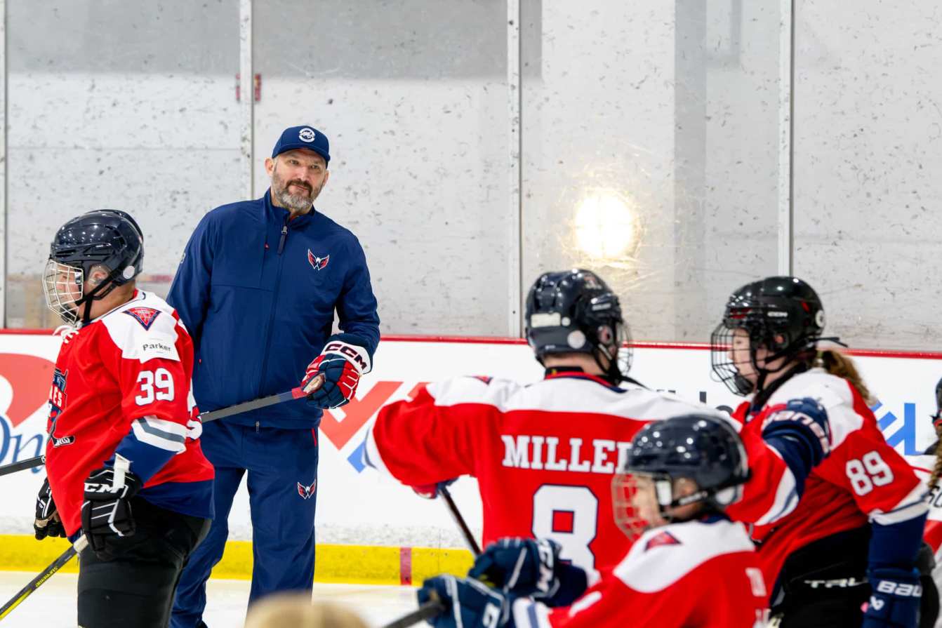Alex Ovechkin skates with young players at the American Special Hockey Association clinic