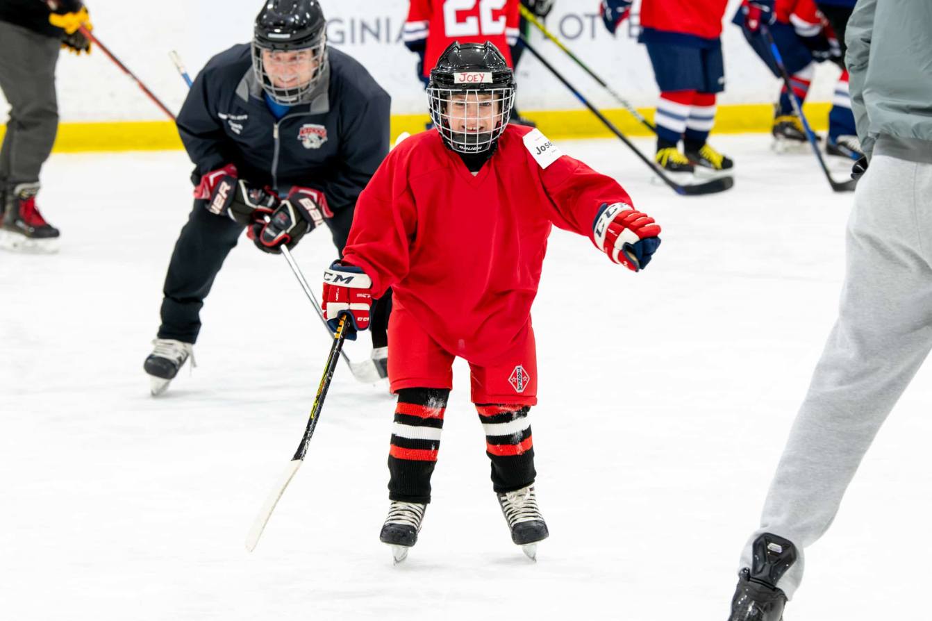 A young player skates at the American Special Hockey Association clinic
