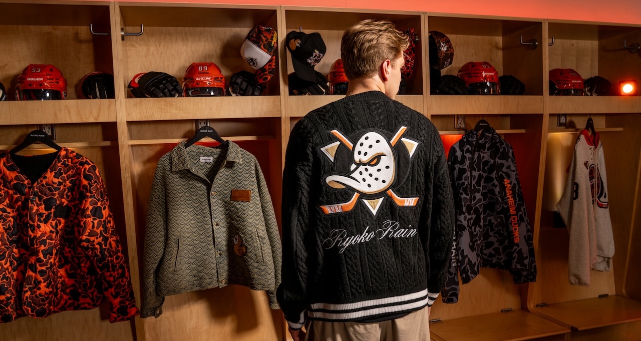 A man wears an Anaheim Ducks X Ryoko Rain jacket