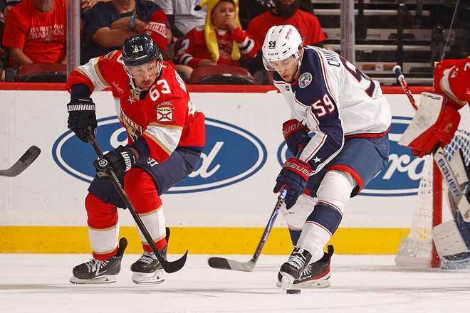 Columbus Blue Jackets v Florida Panthers SUNRISE, FLORIDA - DECEMBER 6: Brad Marchand #63 of the Florida Panthers skates for possession against Yegor Chinakhov #59 of the Columbus Blue Jackets at the Amerant Bank Arena on December 6, 2025 in Sunrise, Florida. (Photo by Eliot J. Schechter/NHLI via Getty Images)