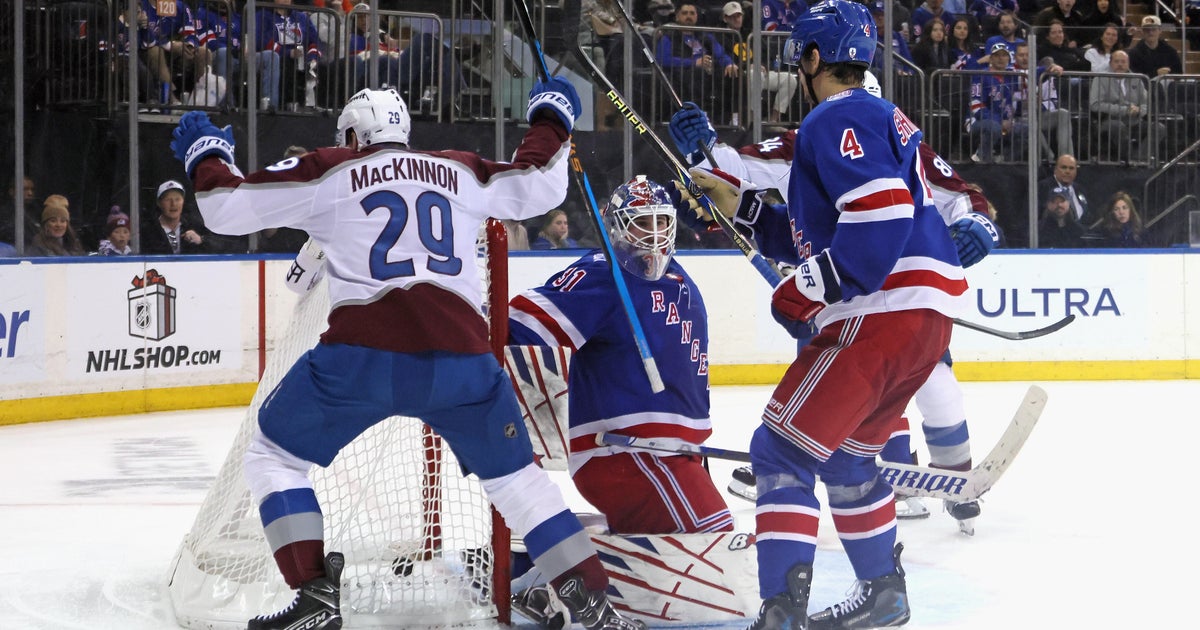 MacKinnon scores twice as Avalanche beat Rangers 3-2 in overtime