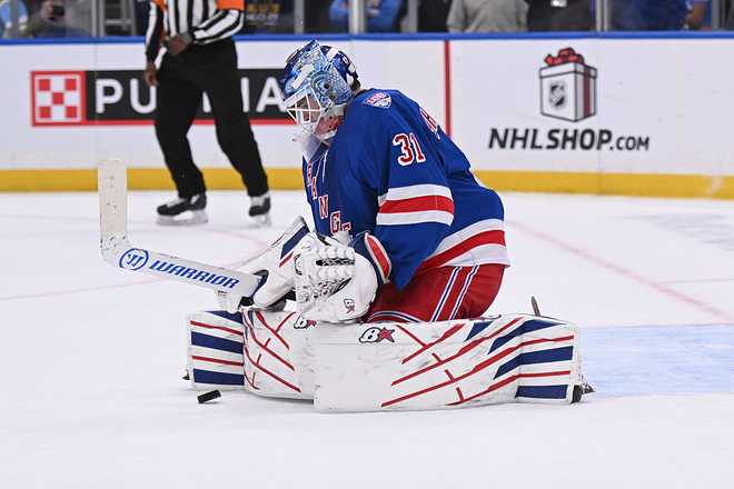 ST. LOUIS, MO - DECEMBER 18: Igor Shesterkin #31 of the New York Rangers makes a save against the St. Louis Blues on December 18, 2025 at the Enterprise Center in St. Louis, Missouri. (Photo by Alexis R. Knight/NHLI via Getty Images)