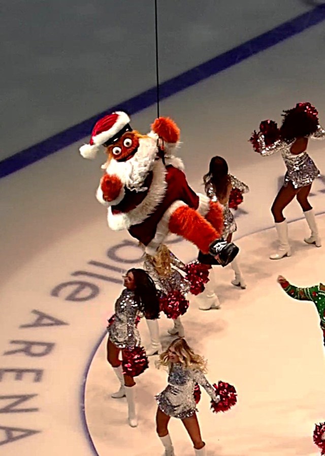 Flyers mascot Gritty drops from the rafters at the Xfinity Mobile Arena