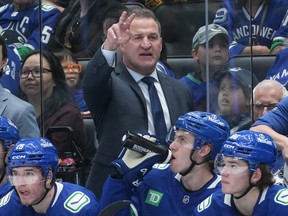 canucks coach adam foote