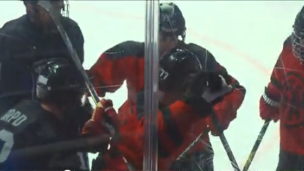 Grand Rapids Fire Department, Police Department hold charity hockey game