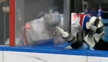 Insane chain-reaction hit in KHL sees player checked into bench send backup goaltender through the glass