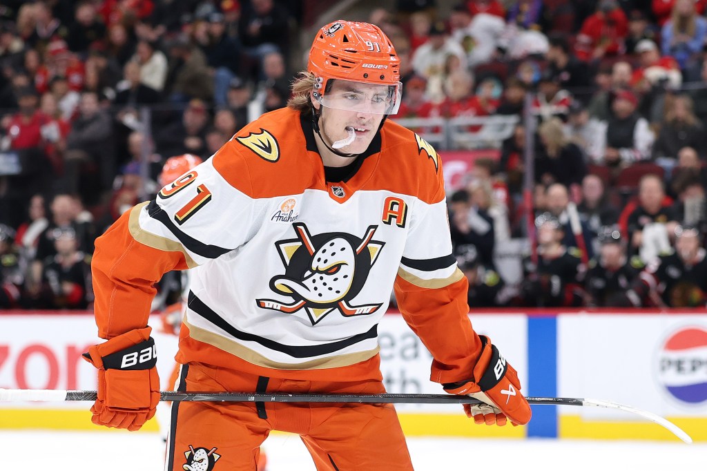 Leo Carlsson of the Anaheim Ducks looks on against the Chicago Blackhawks.