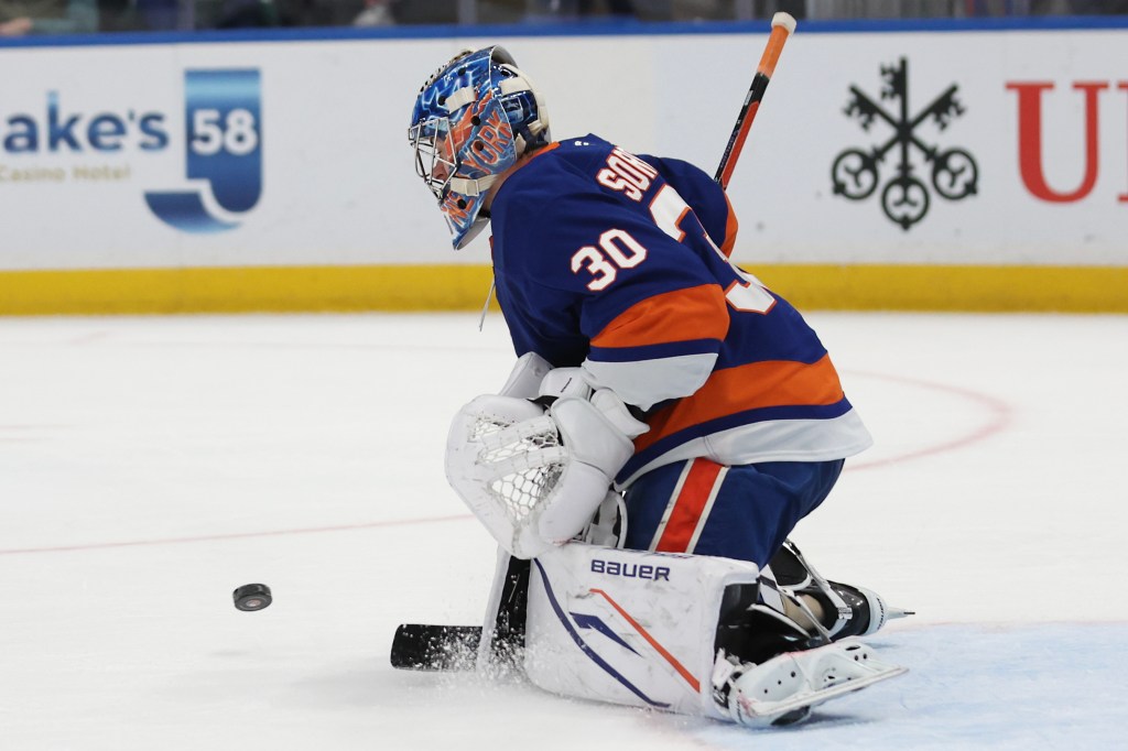  Vancouver Canucks vs. New York Islanders at UBS Arena - New York Islanders goaltender Ilya Sorokin (30) makes a save against Vancouver Canucks left wing Evander Kane (91) during the second period of a game at UBS Arena in Elmont, N.Y. on Friday, Dec. 19, 2025.