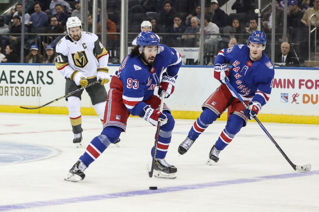 Dec 7, 2025; New York, New York, USA; New York Rangers center Mika Zibanejad (93) controls the puck in the third period against the Vegas Golden Knights at Madison Square Garden.
