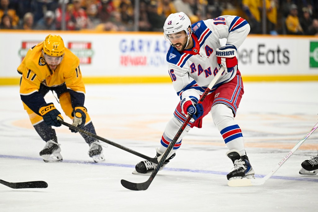 New York Rangers center Vincent Trocheck (16) skates with the puck against the Nashville Predators.