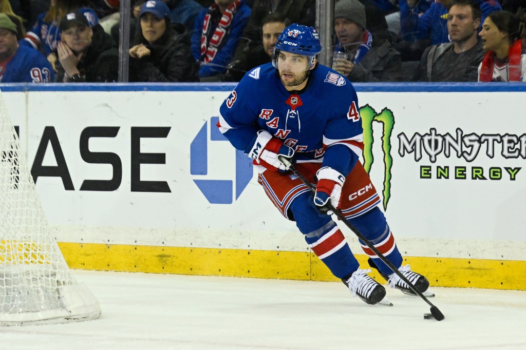 Conor Sheary skates with the puck from behind the net during the Rangers' 3-2 overtime win over the Stars at Madison Square Garden on Dec. 2, 2025.