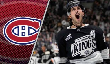 Los Angeles Kings center Phillip Danault skating during a game, subject of recent NHL trade rumors regarding a potential move to Montreal or New Jersey.