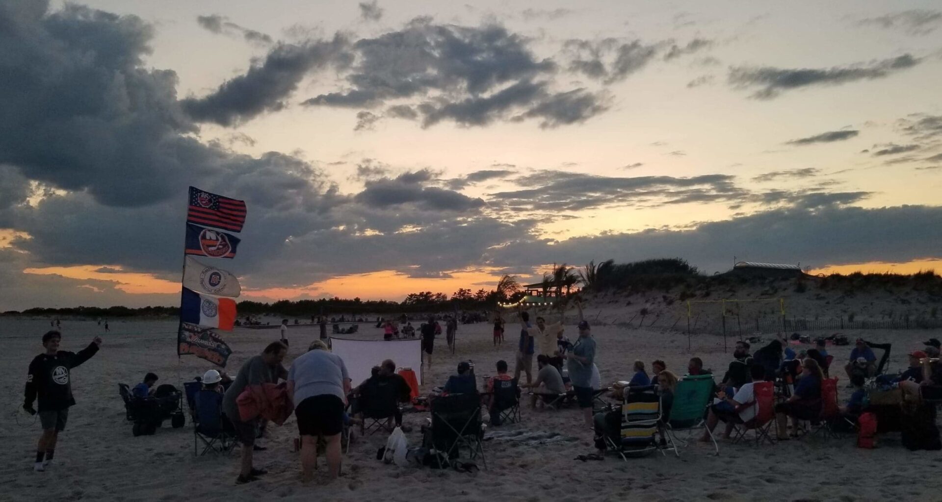New York Islanders Fans Takeover Beach to Watch Series Clinching Win