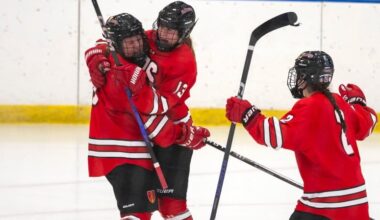 Tess Mulkerron (left), Erin Flaherty (middle) and Maggie Berleth (right) celebrate in St. Paul's upset of Williston in the 2023 Harrington. (Patrick Donnelly/NEHJ)