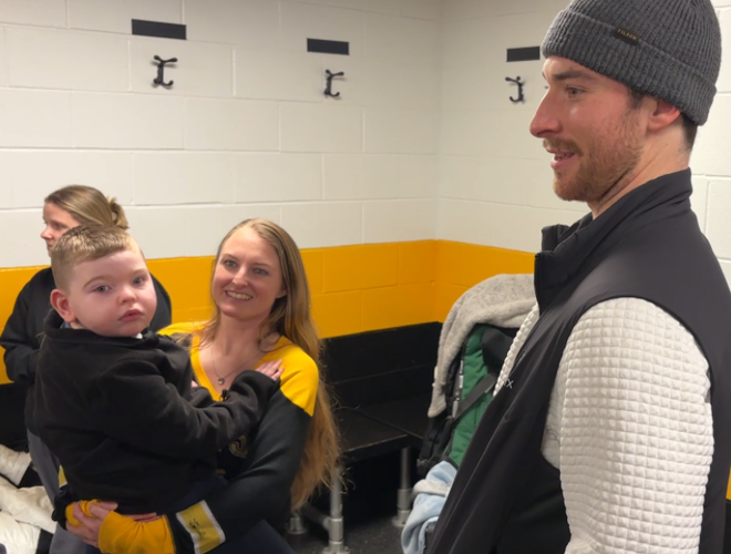 Jeremy Swayman with McCarthy family mccarthy family and frank squeo