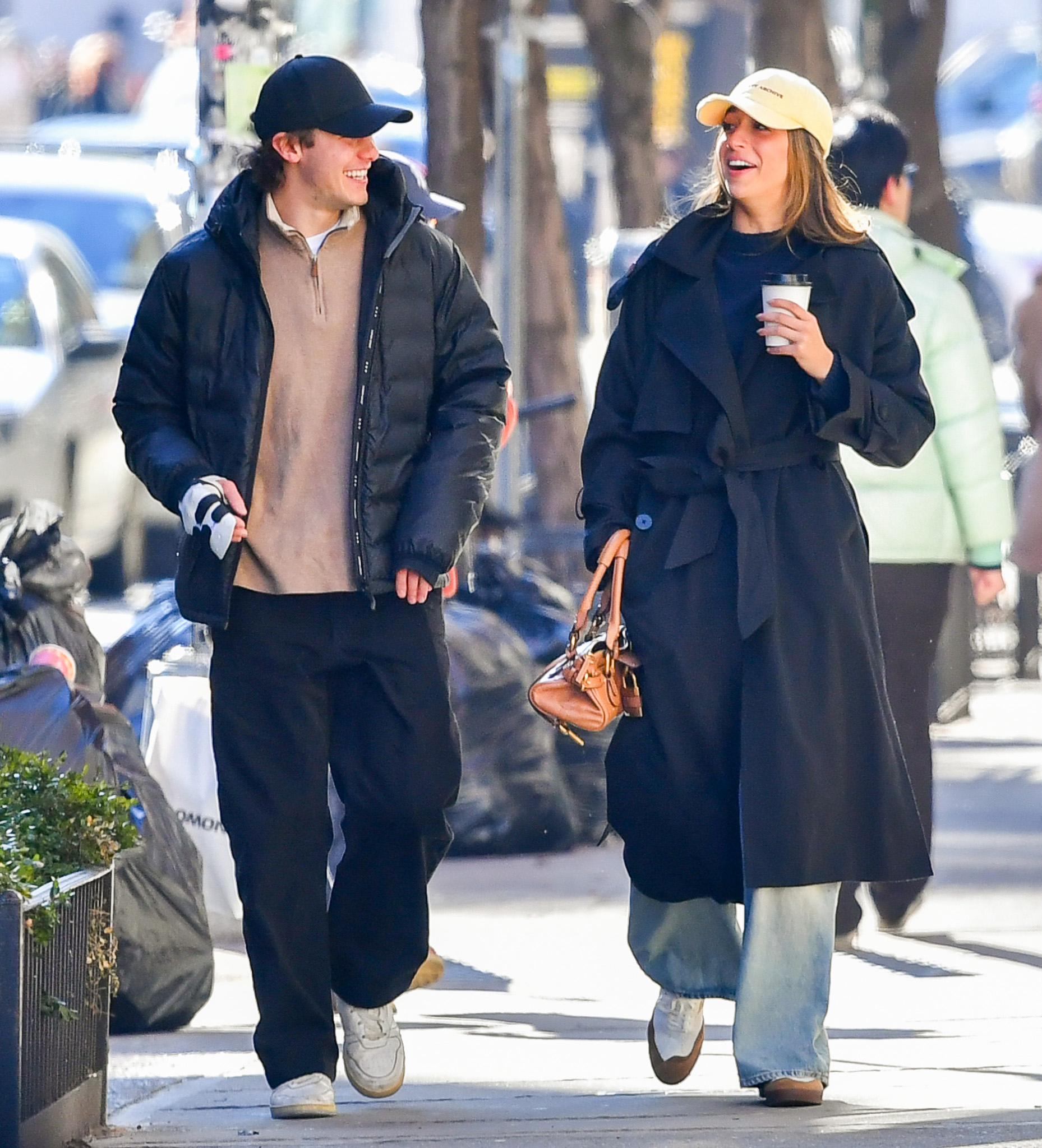 Tate McRae and Jack Hughes walk around on a date in NYC.