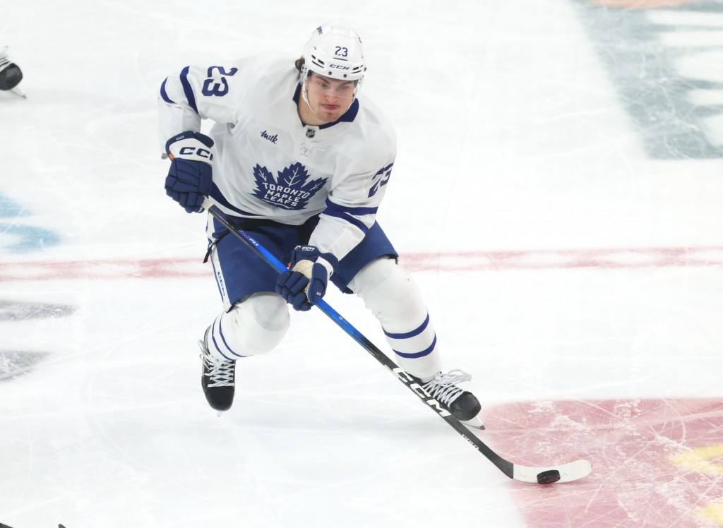 Toronto Maple Leafs left wing Matthew Knies (23) skates with the puck.