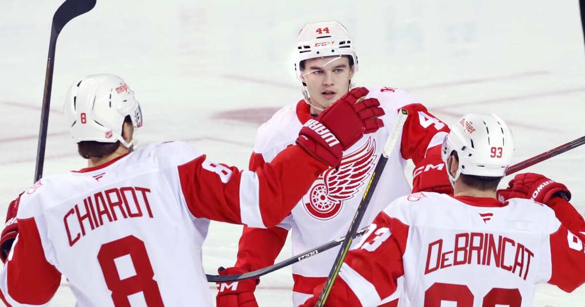 Alex DeBrincat has 2 goals and an assist as Red Wings hold off Flames 4-3