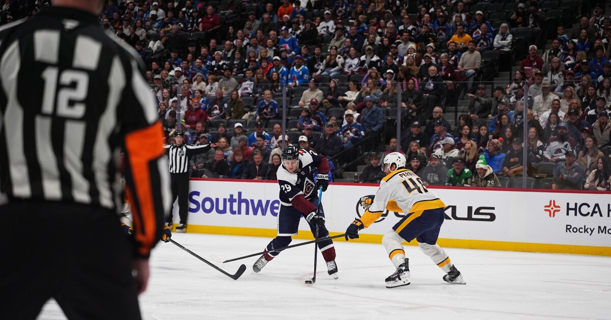 MacKinnon has goal, assist as Avs beat Predators 4-2 for 11th straight home win