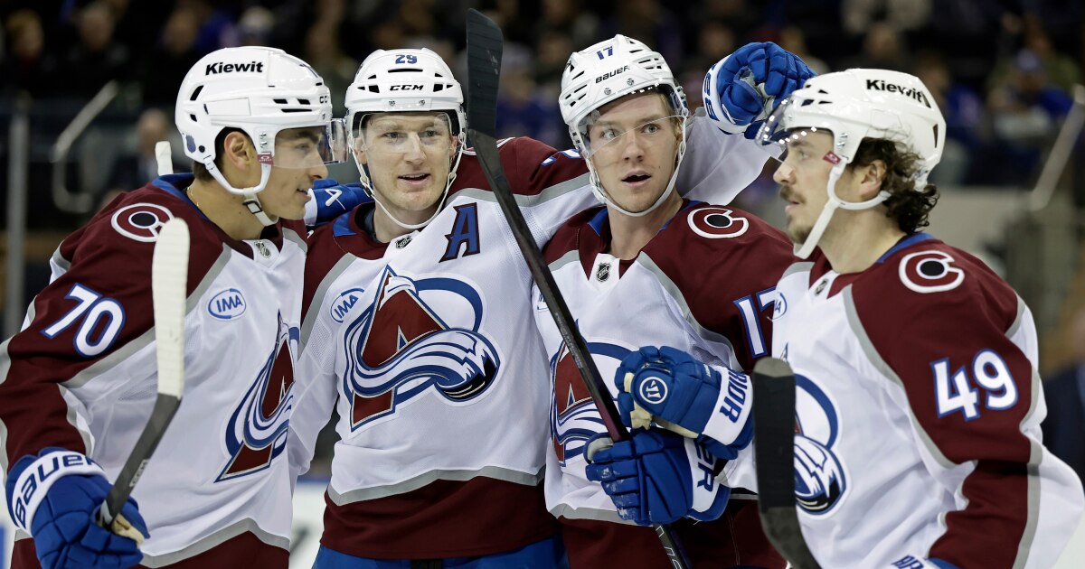 MacKinnon scores twice as the Avalanche beat the Rangers 3-2 in overtime