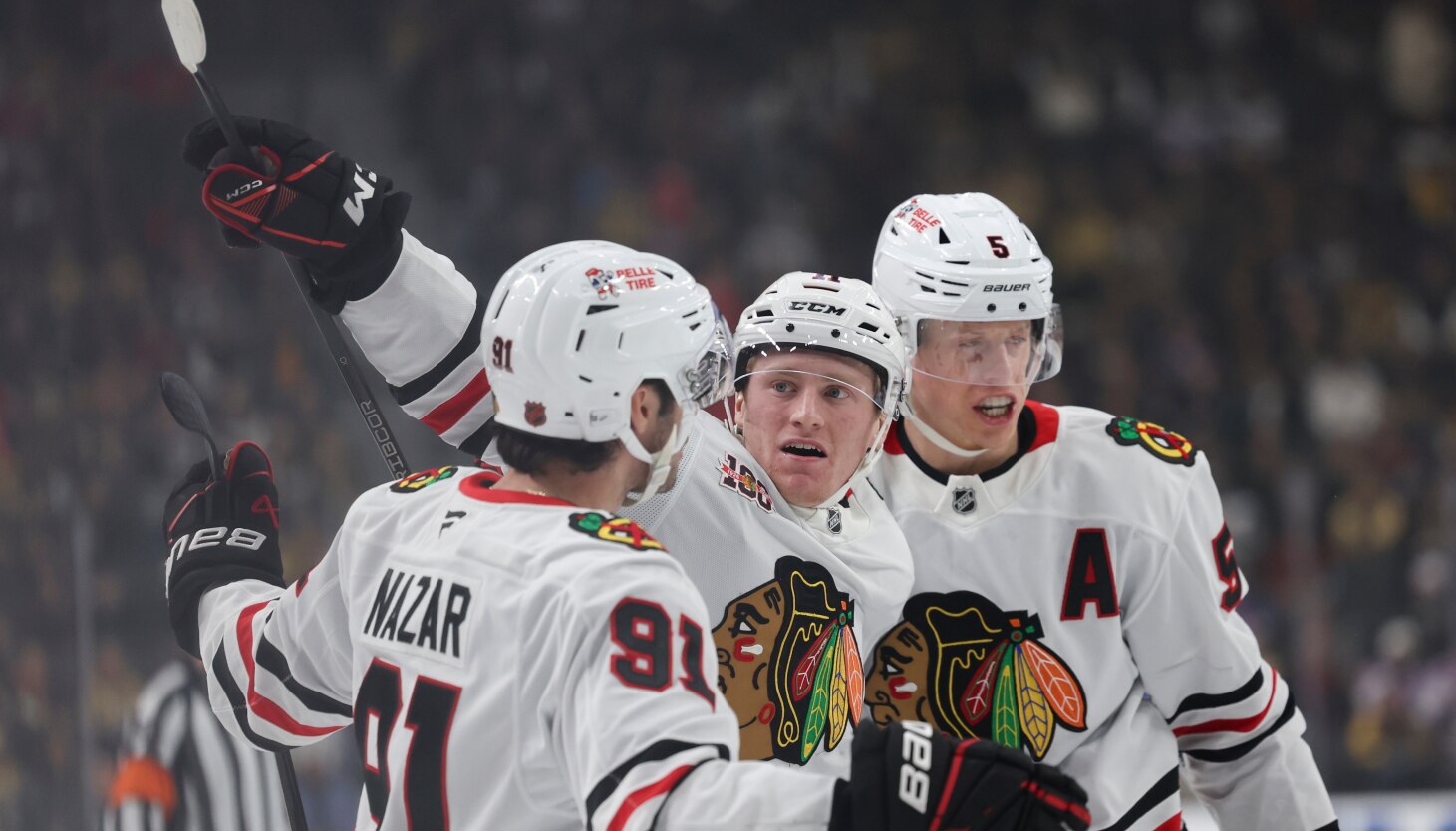 Blackhawks' youngsters learning how to play competently even when not feeling their best