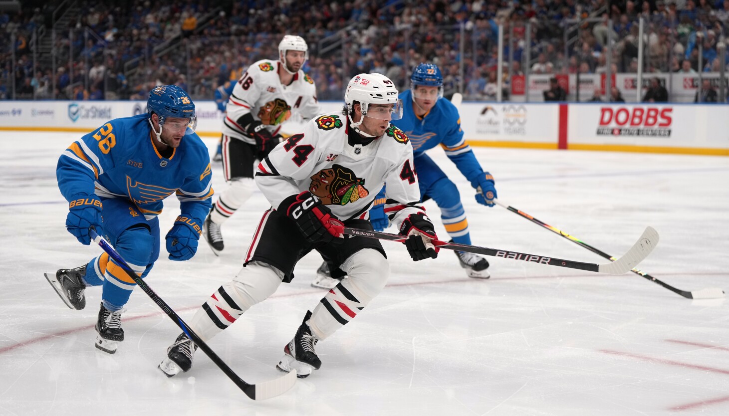 Blackhawks defenseman Wyatt Kaiser has found another outlet for his creativity: playing guitar