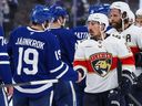 Florida Panthers winger Brad Marchand shakes hands with members of the Toronto Maple Leafs after Game 7 of their second-round playoff series last year.