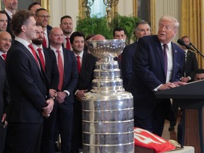 Members of the Florida Panthers look on as U.S. President Donald Trump speaks during a ceremony to honour the 2025 Stanley Cup champions.