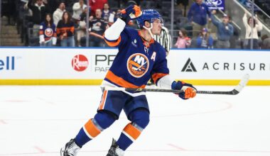 Nov 23, 2025; Elmont, New York, USA;  New York Islanders center Bo Horvat (14) celebrates after scoring a goal during a shootout in overtime against the Seattle Kraken at UBS Arena. Mandatory Credit: Wendell Cruz-Imagn Images