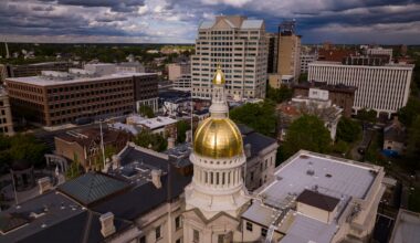 Aerial view of Trenton New Jersey Skyline featuring state capitol dome of New Jersey