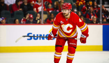 Jan 17, 2026; Calgary, Alberta, CAN; Calgary Flames defenseman Rasmus Andersson (4) against the New York Islanders during the second period at Scotiabank Saddledome. Mandatory Credit: Sergei Belski-Imagn Images