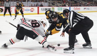 Apr 8, 2025; Pittsburgh, Pennsylvania, USA;  Chicago Blackhawks center Connor Bedard (98) and Pittsburgh Penguins center Sidney Crosby (87) take a third period face-off at PPG Paints Arena. Mandatory Credit: Charles LeClaire-Imagn Images