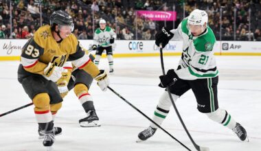 Mitch Marner defends against Jason Robertson