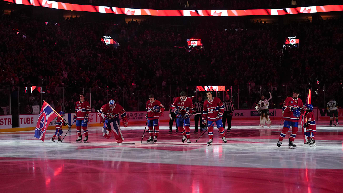 Jan 27, 2026; Montreal, Quebec, CAN; Montreal Canadiens players during the National Anthem before the game against the Vegas Golden Knights at the Bell Centre. Mandatory Credit: Eric Bolte-Imagn Images