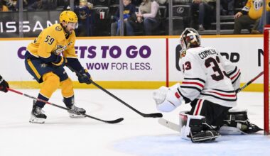 Jan 10, 2026; Nashville, Tennessee, USA;  Chicago Blackhawks goaltender Drew Commesso (33) blocks the shot of Nashville Predators defenseman Roman Josi (59) during the third period at Bridgestone Arena. Mandatory Credit: Steve Roberts-Imagn Images