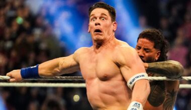 Jey Uso pushes John Cena off the ring Saturday, Feb. 1, 2025, during the WWE Royal Rumble at Lucas Oil Stadium in Indianapolis.