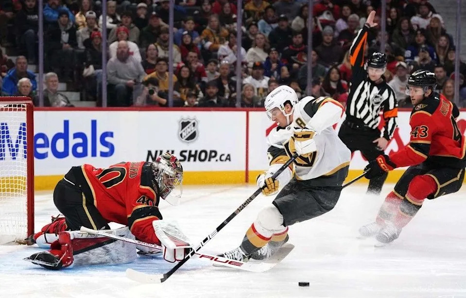  The Vegas Golden Knights’ Mitch Marner loses the puck in front of Ottawa Senators goaltender Mads Sogaard as Tyler Kleven (43) is called for hooking on the breakaway, leading to a penalty shot, during the first period in Ottawa, on Sunday, Jan. 25, 2026.